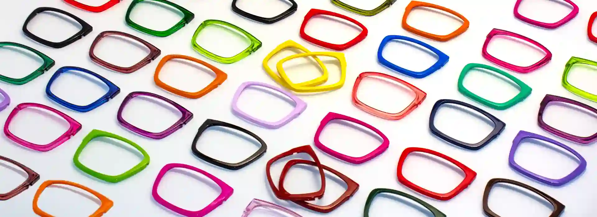 XCombo Eyewear Store Homepage banner showing multiple colorful XCombo Top Frames displayed together, highlighting interchangeable eyewear options