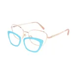 xcombo-mira-rose-gold-base-frame-angle-left-with-top-split Mira large metal cat-eye base frame in Rose Gold by XCombo, 45-degree view with top frame detached. Showcasing customizable combination with Mira series top frames, premium metal base frame.