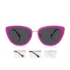 Straight-on XCombo Aura Hot Pink Sun Topper with dark polarized lenses fitted over the everyday optical base frame