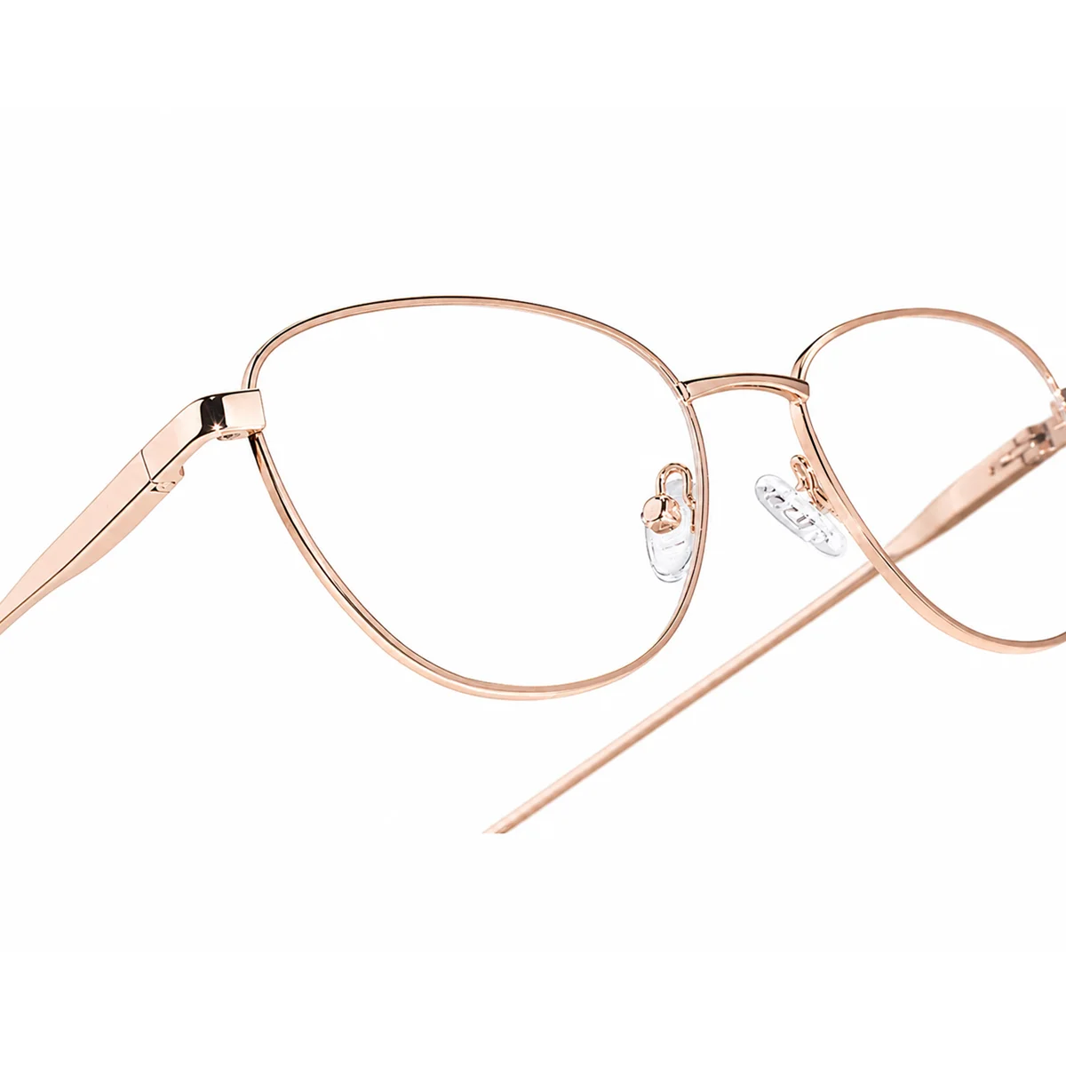 Close-up of XCombo rose gold cat-eye metal base frame and bridge details