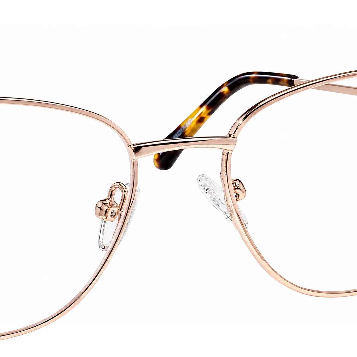 xcombo-rose-gold-cat-eye-glasses-aura-detail XCombo rose gold cat-eye metal base frame with adjustable clear nose pads