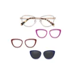 XCombo Aura rose gold cat-eye metal base frame with pink and burgundy solid color toppers and a navy polarized sun topper.